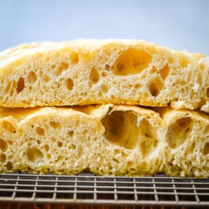 This no-knead focaccia bread is soft, fluffy on the inside, and perfectly golden and crisp on the outside with minimal effort. Made with simple pantry staples, this easy focaccia recipe uses a stretch-and-fold method instead of kneading, making it perfect for beginners. If you’re looking for an easy homemade focaccia bread recipe, this one delivers bakery-quality results every time.
