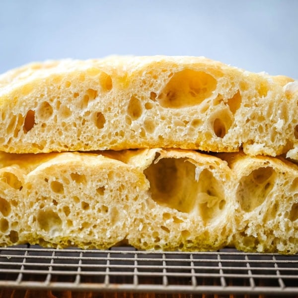 This no-knead focaccia bread is soft, fluffy on the inside, and perfectly golden and crisp on the outside with minimal effort. Made with simple pantry staples, this easy focaccia recipe uses a stretch-and-fold method instead of kneading, making it perfect for beginners. If you’re looking for an easy homemade focaccia bread recipe, this one delivers bakery-quality results every time.