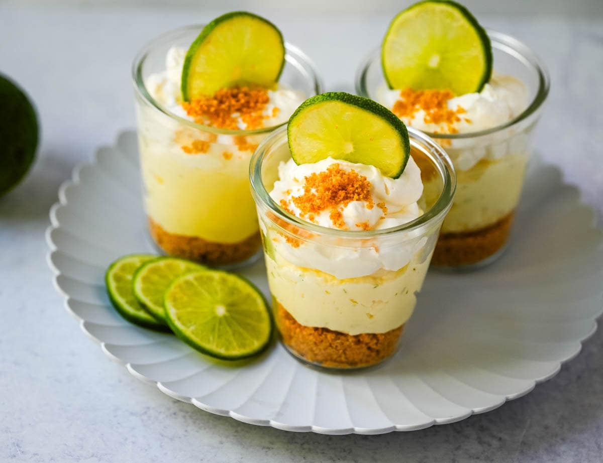 These key lime pie jars are a fresh, creamy twist on the classic key lime pie, made with layers of buttery graham cracker crust, tangy key lime filling, and fluffy whipped cream. Served in individual jars, they are perfect for entertaining or grab-and-go desserts.