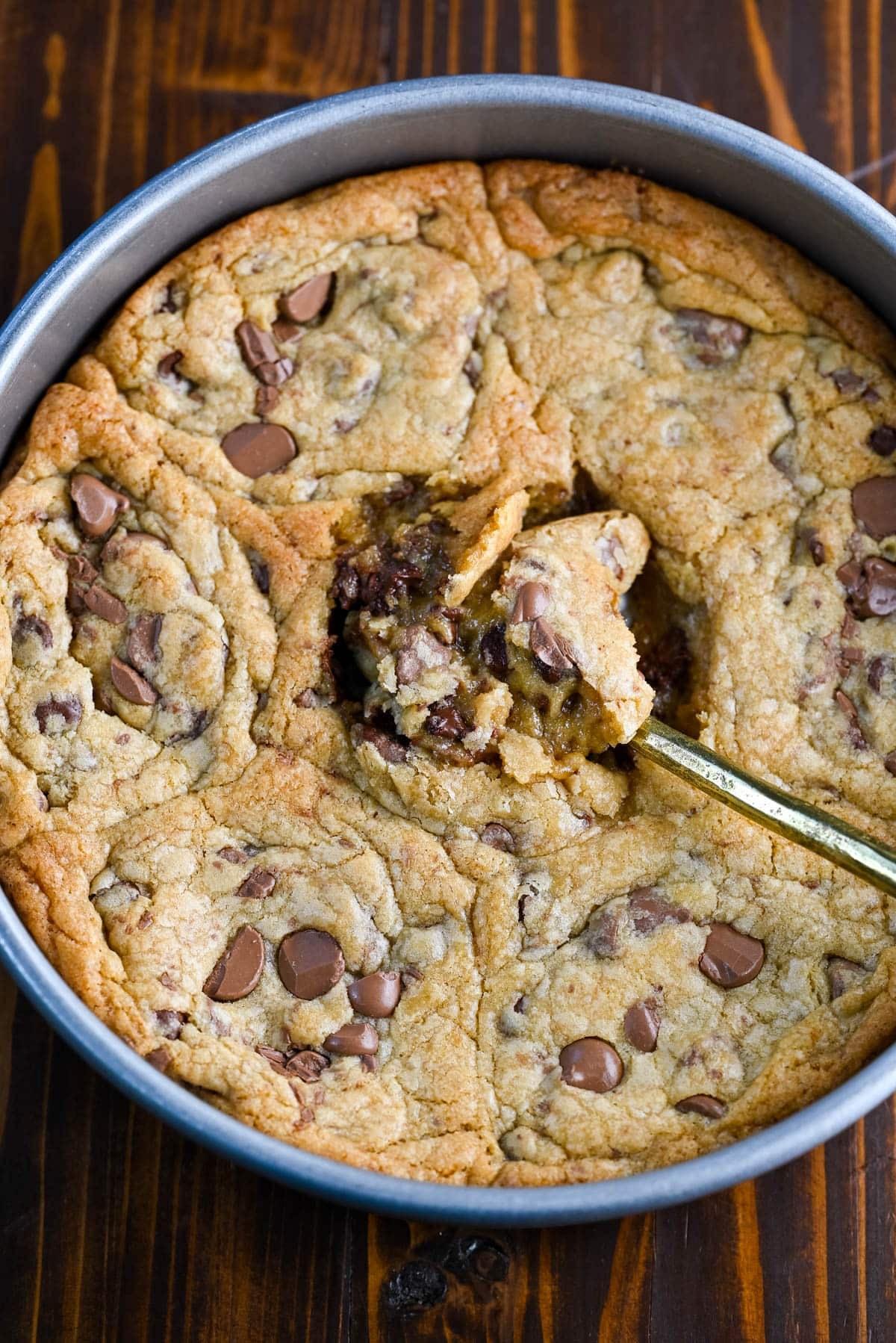 These scoopable cookies are the viral TikTok cookie trend everyone is obsessed with that's soft, gooey, and intentionally slightly underbaked so you can scoop them straight from the pan. Made with classic chocolate chip cookie dough, they bake into a warm, melty, almost brownie-like texture that’s completely irresistible. Instead of perfectly shaped cookies, you get a soft cookie “skillet-style” dessert that’s perfect for spooning and sharing!