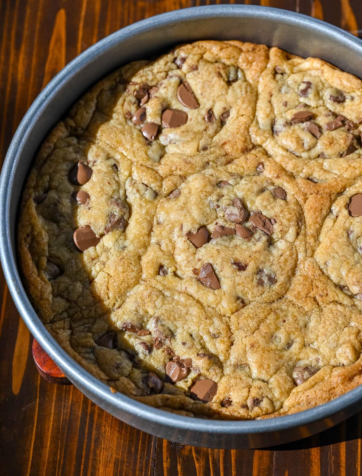These scoopable cookies are the viral TikTok cookie trend everyone is obsessed with that's soft, gooey, and intentionally slightly underbaked so you can scoop them straight from the pan. Made with classic chocolate chip cookie dough, they bake into a warm, melty, almost brownie-like texture that’s completely irresistible. Instead of perfectly shaped cookies, you get a soft cookie “skillet-style” dessert that’s perfect for spooning and sharing!