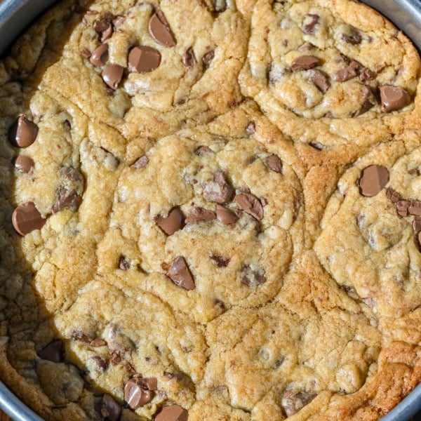 Theseย scoopable cookiesย are the viral TikTok cookie trend everyone is obsessed with that's soft, gooey, and intentionally slightly underbaked so you can scoop them straight from the pan. Made with classic chocolate chip cookie dough, they bake into a warm, melty, almost brownie-like texture thatโs completely irresistible. Instead of perfectly shaped cookies, you get a soft cookie โskillet-styleโ dessert thatโs perfect for spooning and sharing!