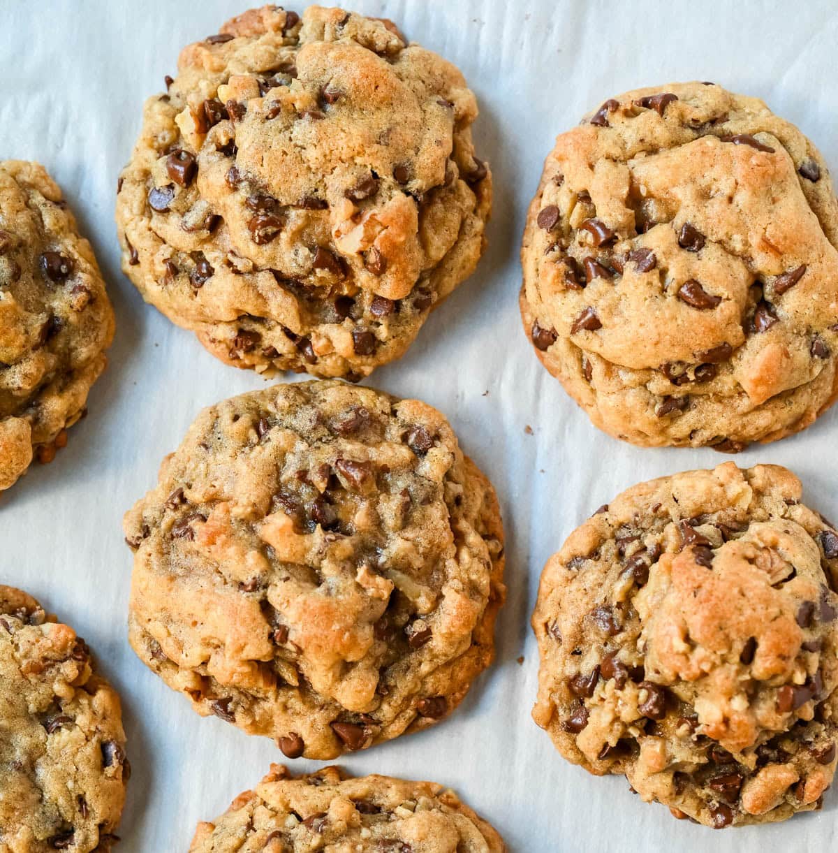 The famous DoubleTree Hotel chocolate chip cookie recipe is officially out — and it's even better homemade. These oversized, chewy, warm cookies are loaded with mini chocolate chips, ground oats for the most incredible texture, and a surprise ingredient. These Doubletree Hotel copycat chocolate chip cookies are the perfect chocolate chip cookie recipe.