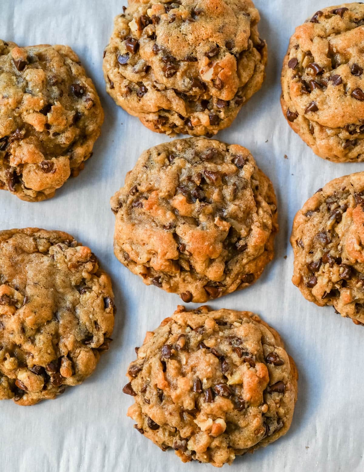 The famous DoubleTree Hotel chocolate chip cookie recipe is officially out — and it's even better homemade. These oversized, chewy, warm cookies are loaded with mini chocolate chips, ground oats for the most incredible texture, and a surprise ingredient. These Doubletree Hotel copycat chocolate chip cookies are the perfect chocolate chip cookie recipe.