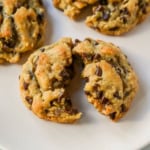 The famous DoubleTree Hotel chocolate chip cookie recipe is officially out — and it's even better homemade. These oversized, chewy, warm cookies are loaded with mini chocolate chips, ground oats for the most incredible texture, and a surprise ingredient. These Doubletree Hotel copycat chocolate chip cookies are the perfect chocolate chip cookie recipe.