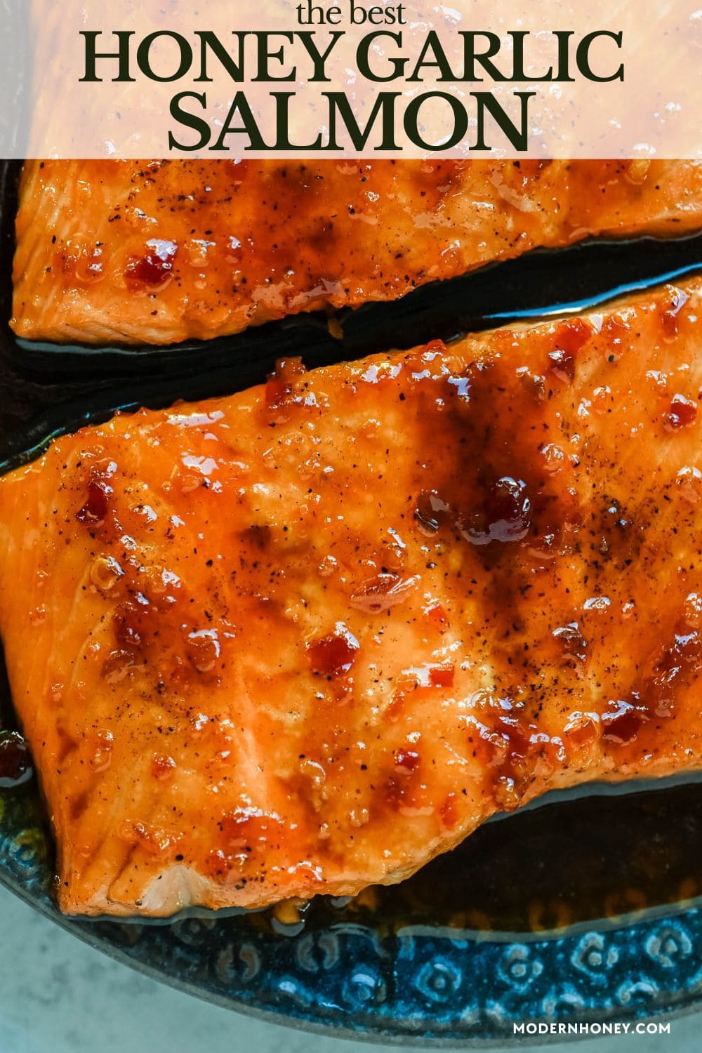 The Best Honey Garlic Glazed Salmon (Sticky, Sweet & Spicy) is the most incredible easy weeknight dinner recipe that comes together in just one pan in under 20 minutes from start to finish. Sticky sweet and garlicky, this glazed salmon recipe is hands down the most addicting salmon you will ever make coated in a rich homemade honey garlic sauce made with butter, soy sauce, fresh lemon juice, and a kick of chili garlic sauce that takes every single bite completely over the top.