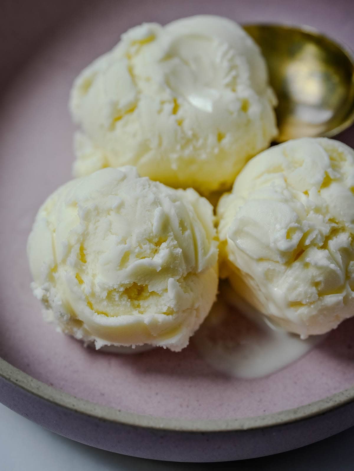 Sweet, creamy, and smooth, this copycat Jeni's Sweet Cream Ice Cream is the homemade ice cream recipe every ice cream lover needs in their life! The secret to Jeni's famously creamy and scoopable texture is a combination of cream cheese, cornstarch, and light corn syrup that prevents ice crystals from forming and keeps every single scoop silky smooth straight from the freezer. This is the ultimate homemade ice cream recipe you will make on repeat all summer long!