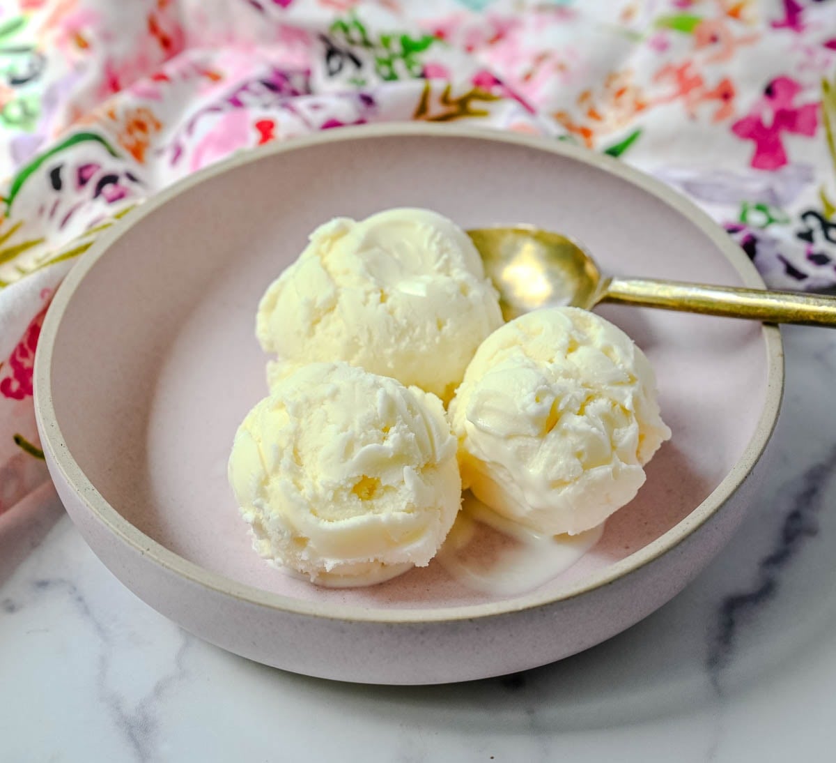 Sweet, creamy, and smooth, this copycat Jeni's Sweet Cream Ice Cream is the homemade ice cream recipe every ice cream lover needs in their life! The secret to Jeni's famously creamy and scoopable texture is a combination of cream cheese, cornstarch, and light corn syrup that prevents ice crystals from forming and keeps every single scoop silky smooth straight from the freezer. This is the ultimate homemade ice cream recipe you will make on repeat all summer long!