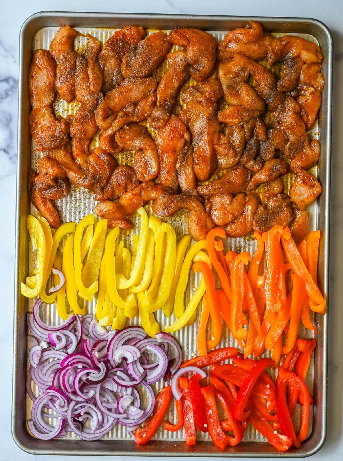 sheet pan chicken fajitas before cooking