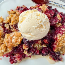 Easy Blackberry Crisp made with juicy blackberries and a buttery brown sugar oat topping. Ready in under an hour — the perfect summer dessert, made with fresh or frozen berries.