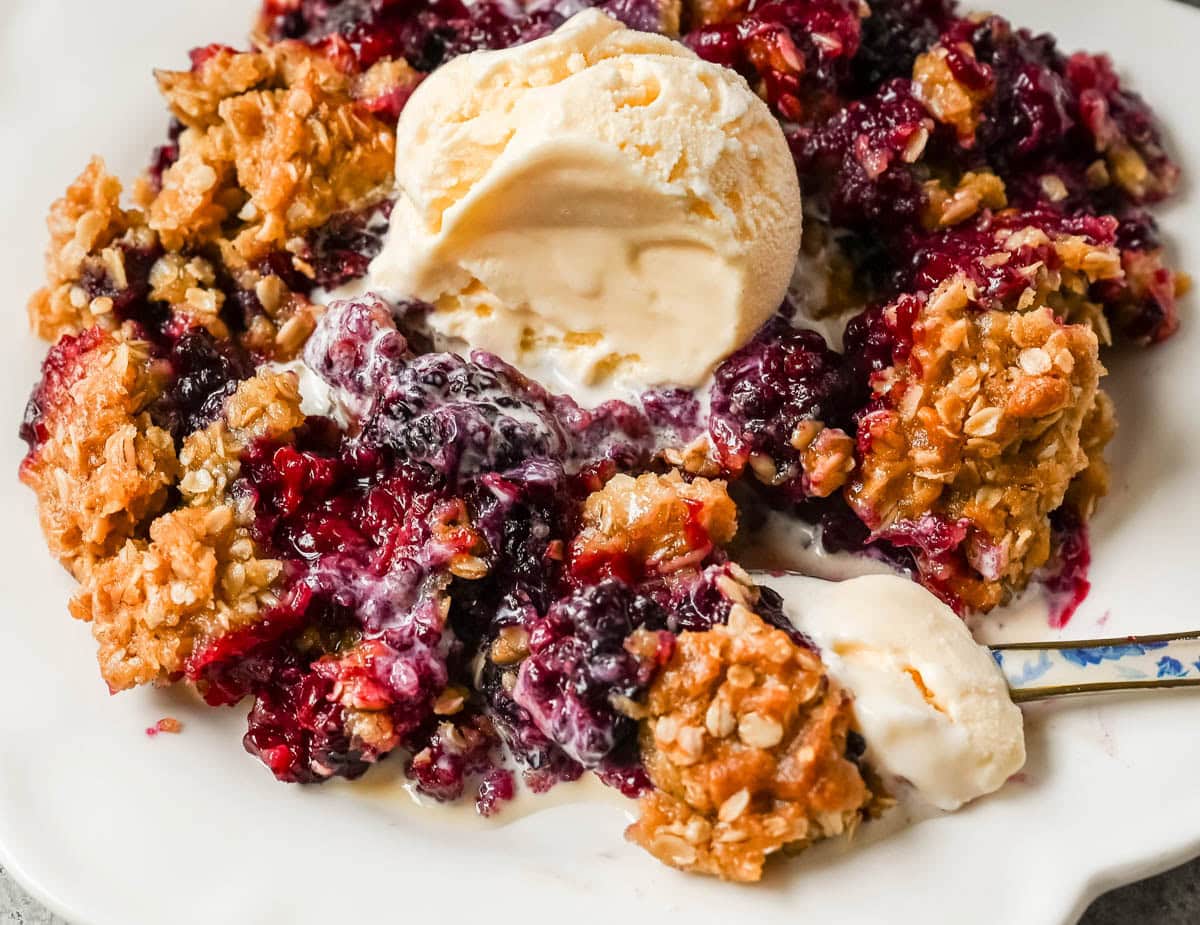 Easy Blackberry Crisp made with juicy blackberries and a buttery brown sugar oat topping. Ready in under an hour — the perfect summer dessert, made with fresh or frozen berries.