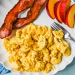 These Cottage Cheese Scrambled Eggs are the creamiest, fluffiest scrambled eggs you'll ever make — with over 20g of protein per serving! Learn the simple technique, the best mix-ins, and every tip for perfect scrambled eggs every time.