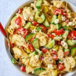 Greek Cheese Tortellini Pasta Salad with fresh tomatoes, cucumbers, red onion, feta cheese, tossed in a tangy homemade Greek dressing. This is such an easy tortellini pasta salad recipe and everyone loves it!