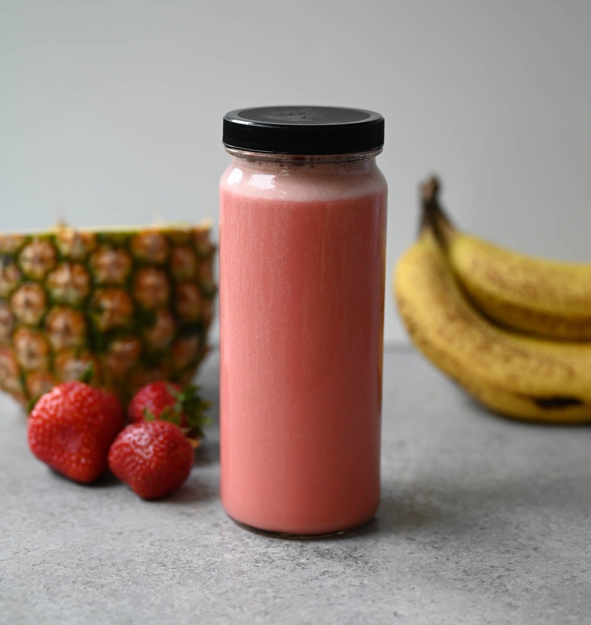 A bright, fruity blend of strawberries, pineapple, and banana with a scoop of Greek yogurt for protein — tastes like a tropical vacation in a glass.