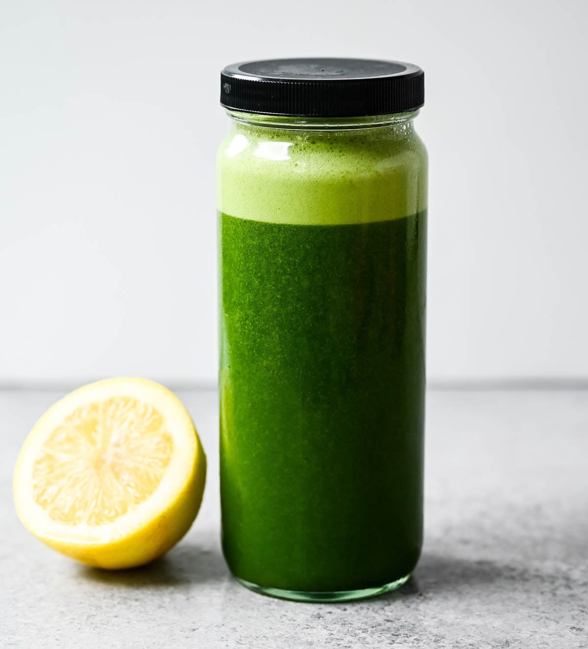 A refreshing, citrusy green smoothie with cucumber and lemon — light, hydrating, and easy to make part of your daily routine. Green smoothie with kale, spinach, cucumber, and lemon