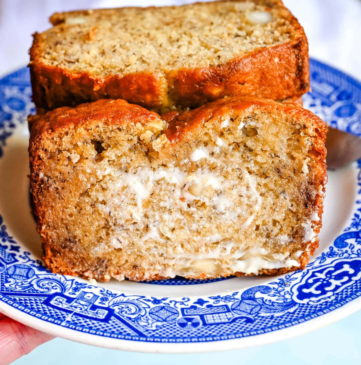 Best Banana Nut Bread Recipe. This is the moistest banana nut bread you'll ever make — a rich, tender loaf made with ripe bananas, sour cream, and your choice of walnuts, pecans, or macadamia nuts. Includes tips for the ultimate moist crumb, a brown sugar topping, and answers to every banana bread question you have.