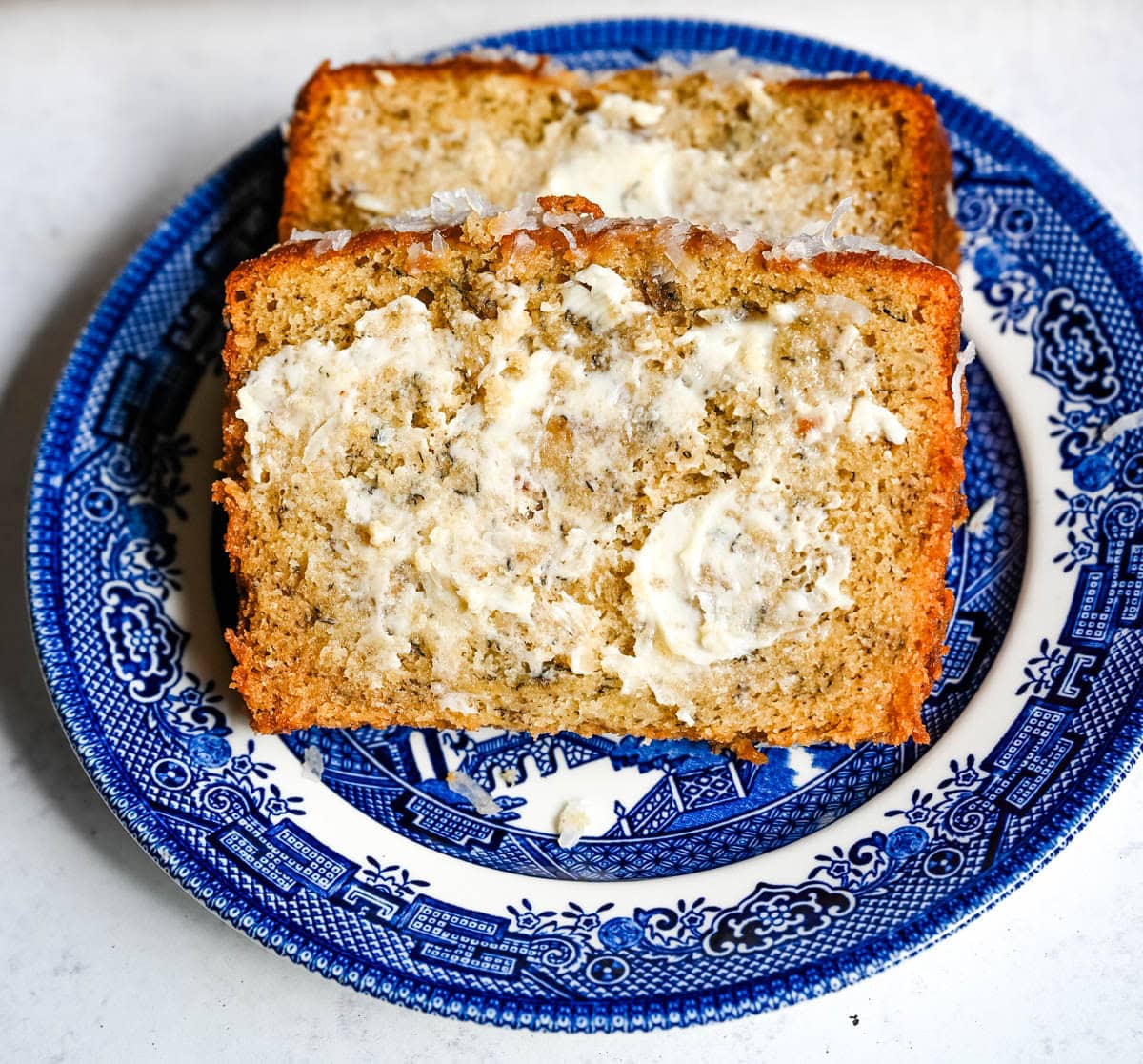 Best Banana Nut Bread Recipe. This is the moistest banana nut bread you'll ever make — a rich, tender loaf made with ripe bananas, sour cream, and your choice of walnuts, pecans, or macadamia nuts. Includes tips for the ultimate moist crumb, a brown sugar topping, and answers to every banana bread question you have.