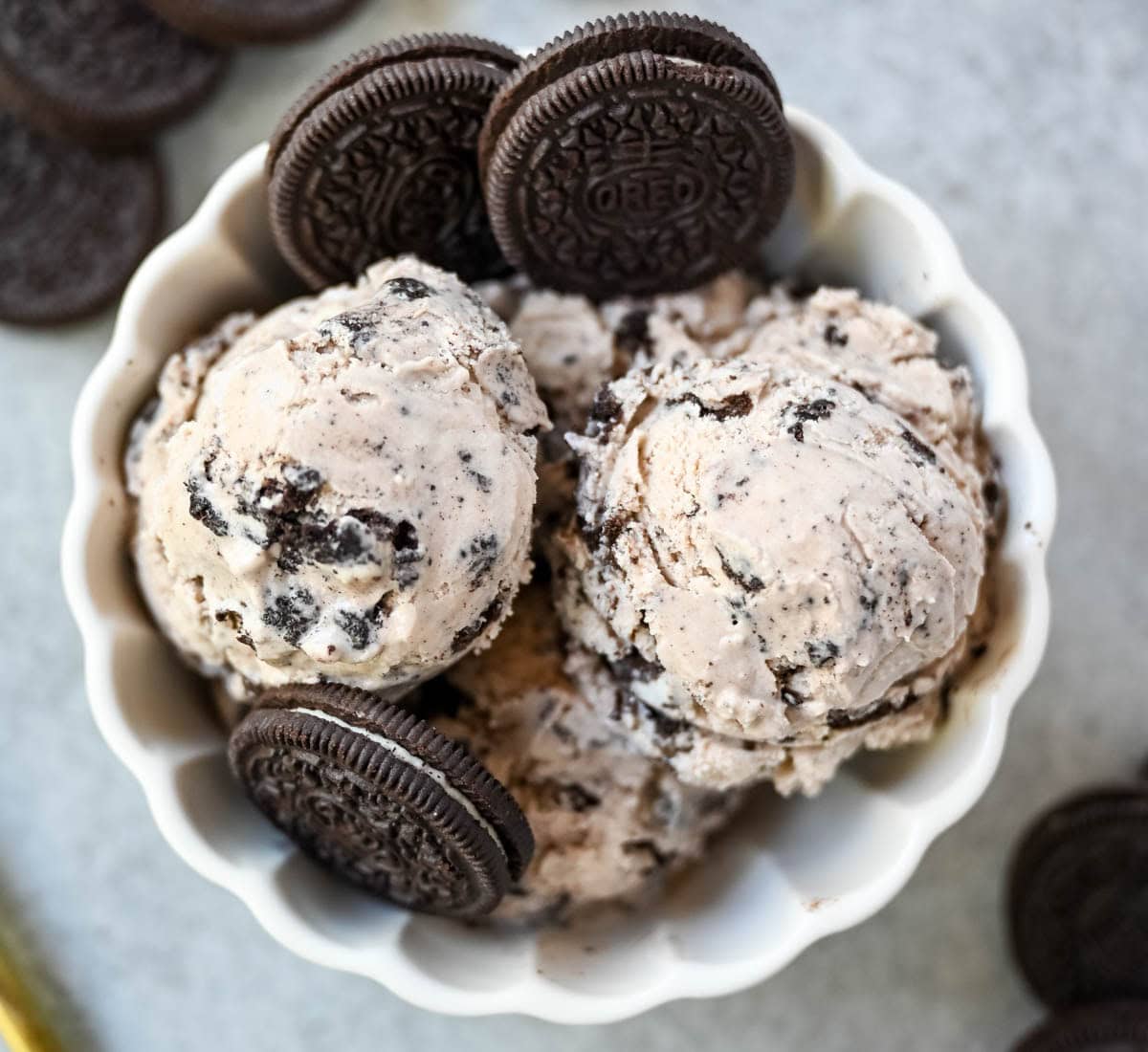 This Cookies and Cream Ice Cream is rich, creamy, and loaded with Oreo chunks. This Oreo Ice Cream is made with a custard base for the smoothest, creamiest homemade ice cream you'll ever make.