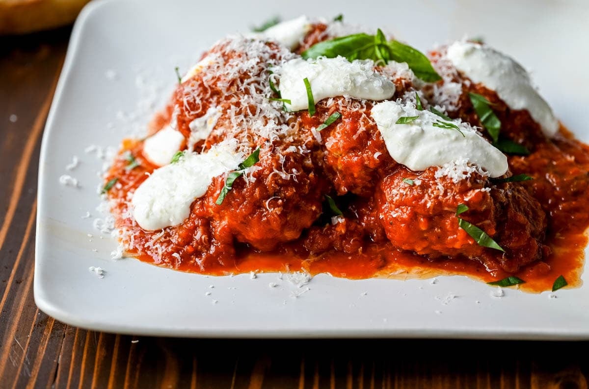 Learn how to make high protein chicken cottage cheese meatballs at home. This easy chicken parmesan meatballs recipe uses whipped cottage cheese, garlic, and parmesan for a juicy, protein-packed dinner that's ready in under 30 minutes. Here's the viral TikTok recipe made famous by Hailey Bieber.