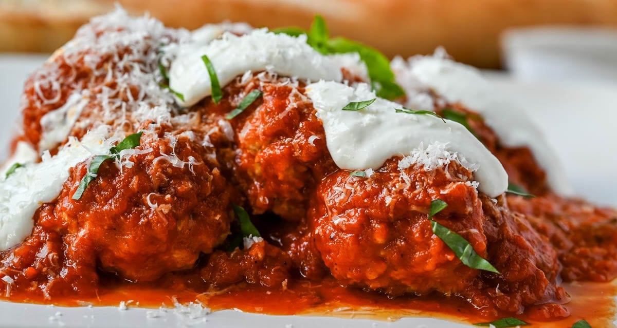 Learn how to make high protein chicken cottage cheese meatballs at home. This easy chicken parmesan meatballs recipe uses whipped cottage cheese, garlic, and parmesan for a juicy, protein-packed dinner that's ready in under 30 minutes. Here's the viral TikTok recipe made famous by Hailey Bieber.