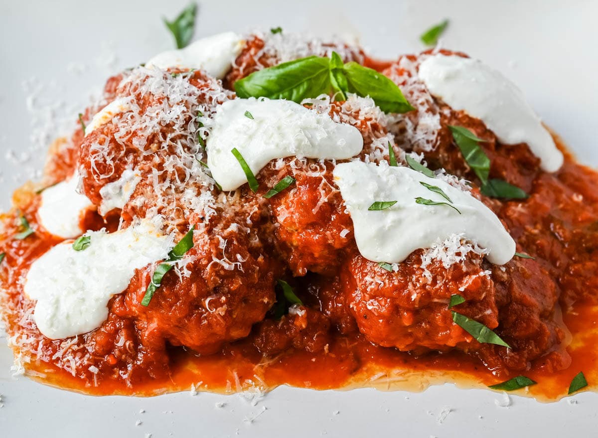 Learn how to make high protein chicken cottage cheese meatballs at home. This easy chicken parmesan meatballs recipe uses whipped cottage cheese, garlic, and parmesan for a juicy, protein-packed dinner that's ready in under 30 minutes. Here's the viral TikTok recipe made famous by Hailey Bieber.