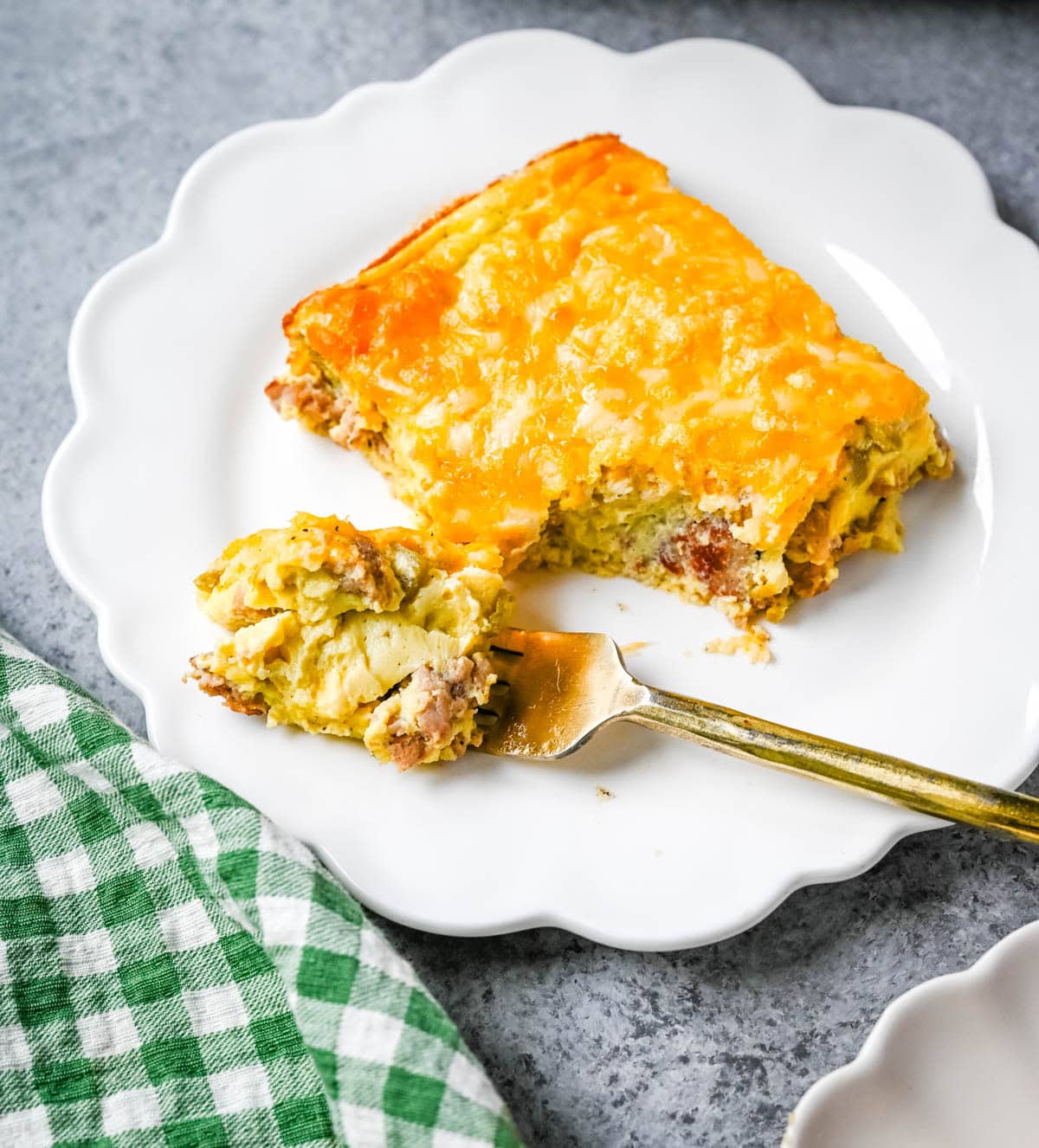 High Protein Turkey Sausage and Green Chile Egg Casserole. This high protein breakfast casserole combines turkey sausage, cottage cheese, cheddar, eggs, and green chiles for a hearty, low-carb make-ahead breakfast. With about 30 grams of protein per serving, this easy egg bake is perfect for meal prep, brunch, or feeding a crowd.
