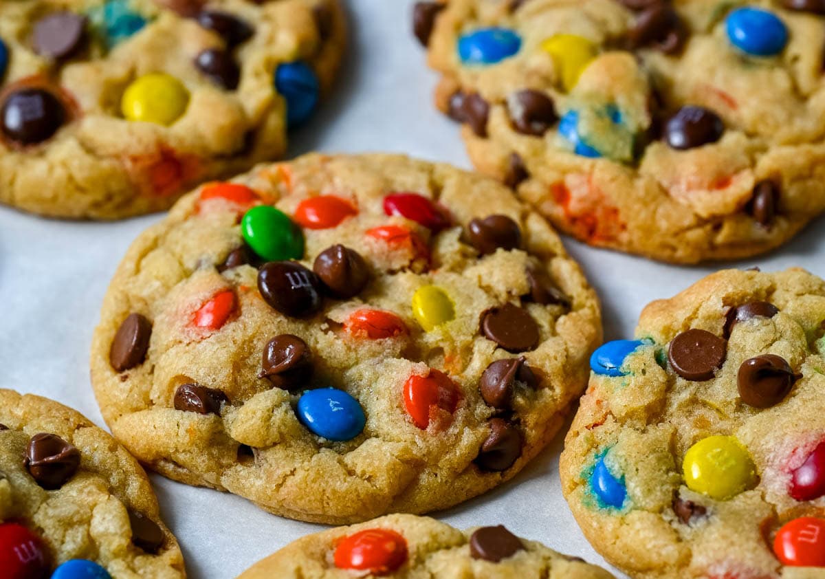 These M&M chocolate chip cookies have crisp, buttery edges and soft, chewy centers, loaded with both M&M's and semi-sweet chocolate chips. No mixer required — just mix in a bowl, chill, and bake for the best chocolate chip M&M cookies!
