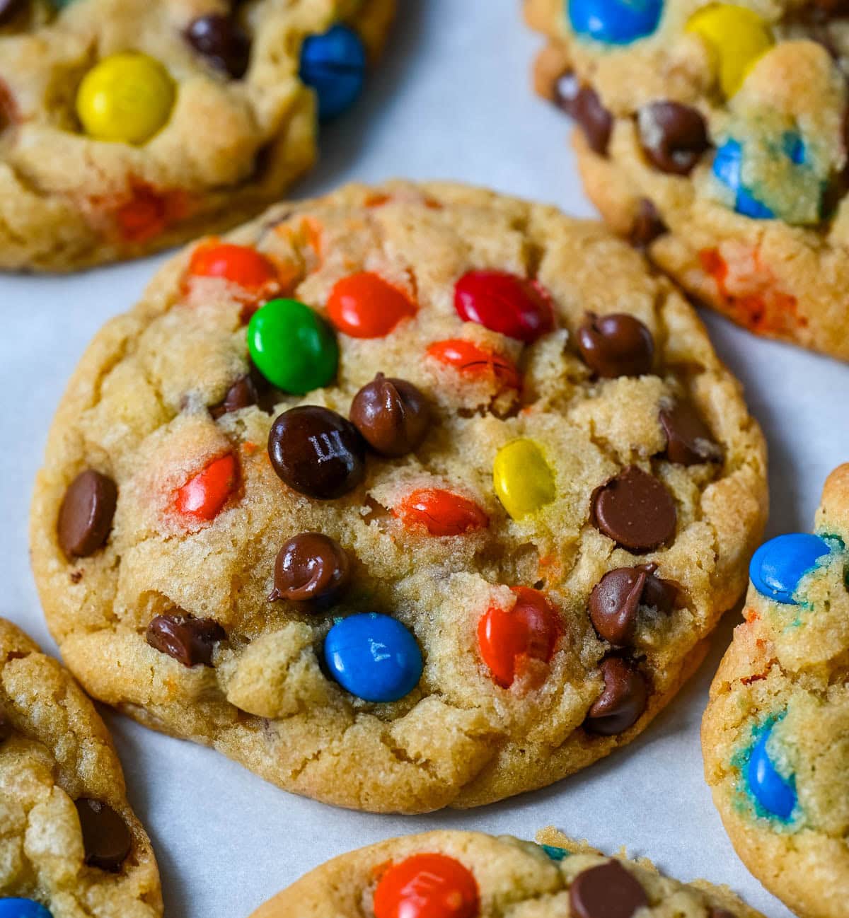 These M&M chocolate chip cookies have crisp, buttery edges and soft, chewy centers, loaded with both M&M's and semi-sweet chocolate chips. No mixer required — just mix in a bowl, chill, and bake for the best chocolate chip M&M cookies!