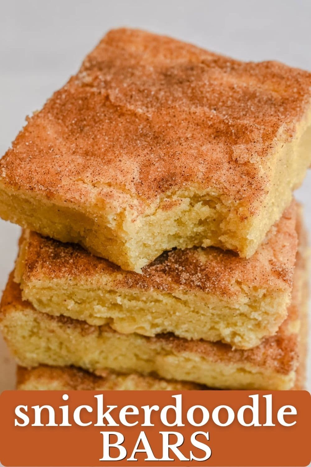 These snickerdoodle bars have all the soft, chewy, cinnamon-sugar flavor of classic snickerdoodle cookies, baked in one pan for an easier, faster version. No scooping, no rolling — just press, sprinkle, and bake for a crowd-sized batch of snickerdoodle flavor in every bite.