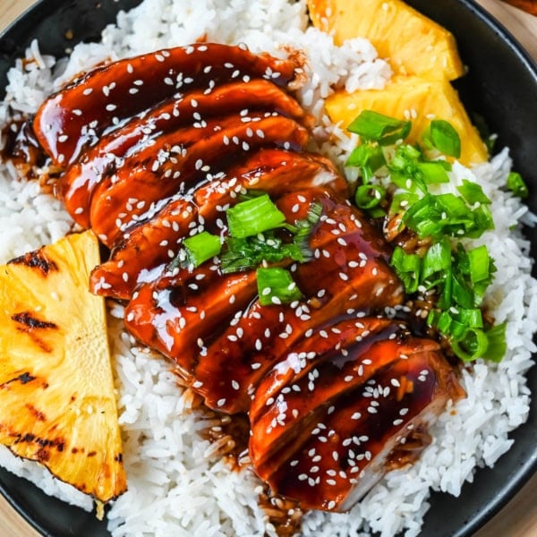 This Hawaiian teriyaki chicken is made with a homemade sweet and savory sauce featuring soy sauce, pineapple juice, brown sugar, honey, garlic, and ginger for that classic island-inspired flavor. It's made two easy ways, grilled for smoky char-grilled flavor or cooked in a skillet for a quick 30 minute weeknight dinner, so you can choose whichever method fits your day.