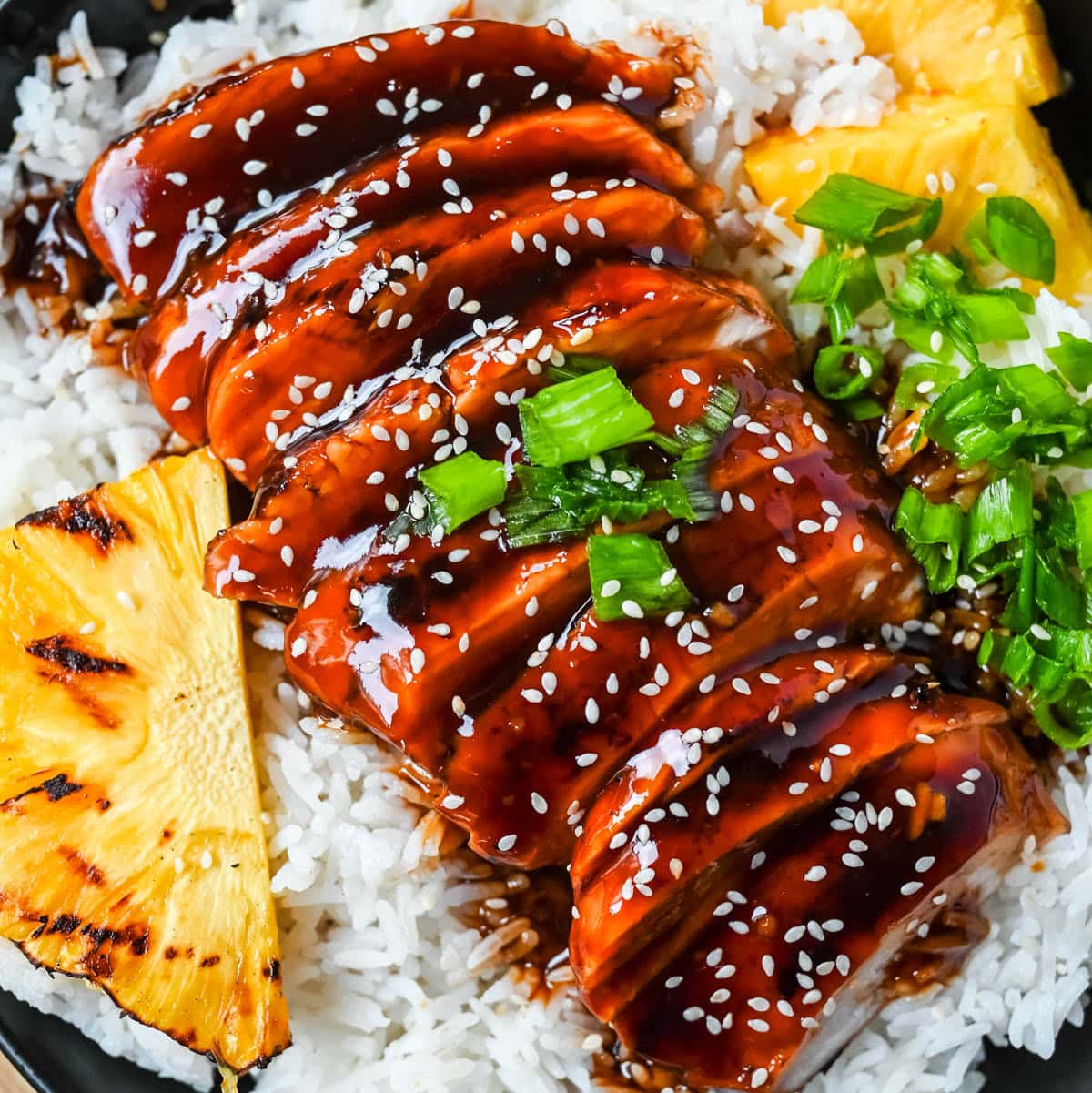 This Hawaiian teriyaki chicken is made with a homemade sweet and savory sauce featuring soy sauce, pineapple juice, brown sugar, honey, garlic, and ginger for that classic island-inspired flavor. It's made two easy ways, grilled for smoky char-grilled flavor or cooked in a skillet for a quick 30 minute weeknight dinner, so you can choose whichever method fits your day.