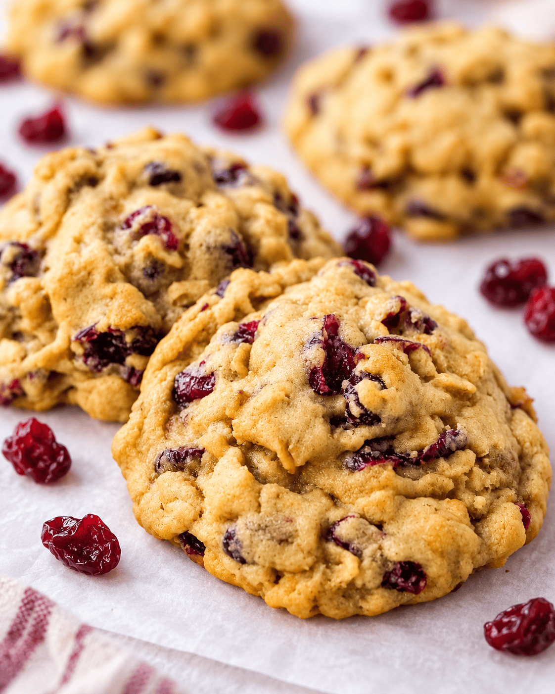 These soft and chewy cranberry oatmeal cookies are packed with sweetened dried cranberries and hearty oats, with a secret ingredient for the perfect texture. These are the best cranberry oatmeal cookies and always receive 5-star reviews.