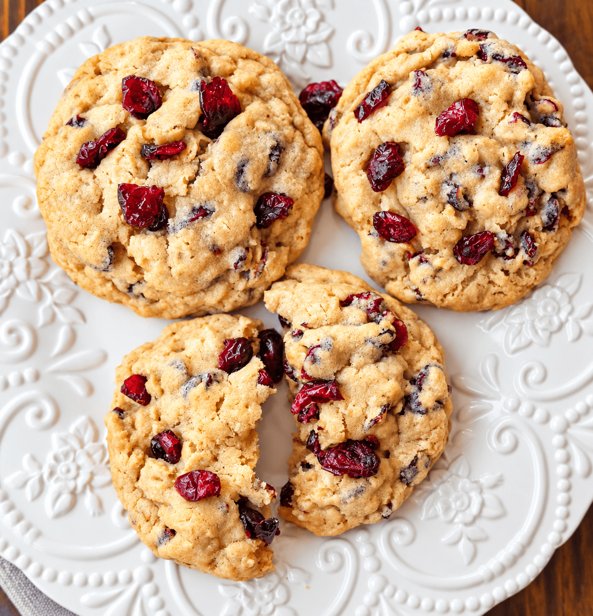 These soft and chewy cranberry oatmeal cookies are packed with sweetened dried cranberries and hearty oats, with a secret ingredient for the perfect texture. These are the best cranberry oatmeal cookies and always receive 5-star reviews.
