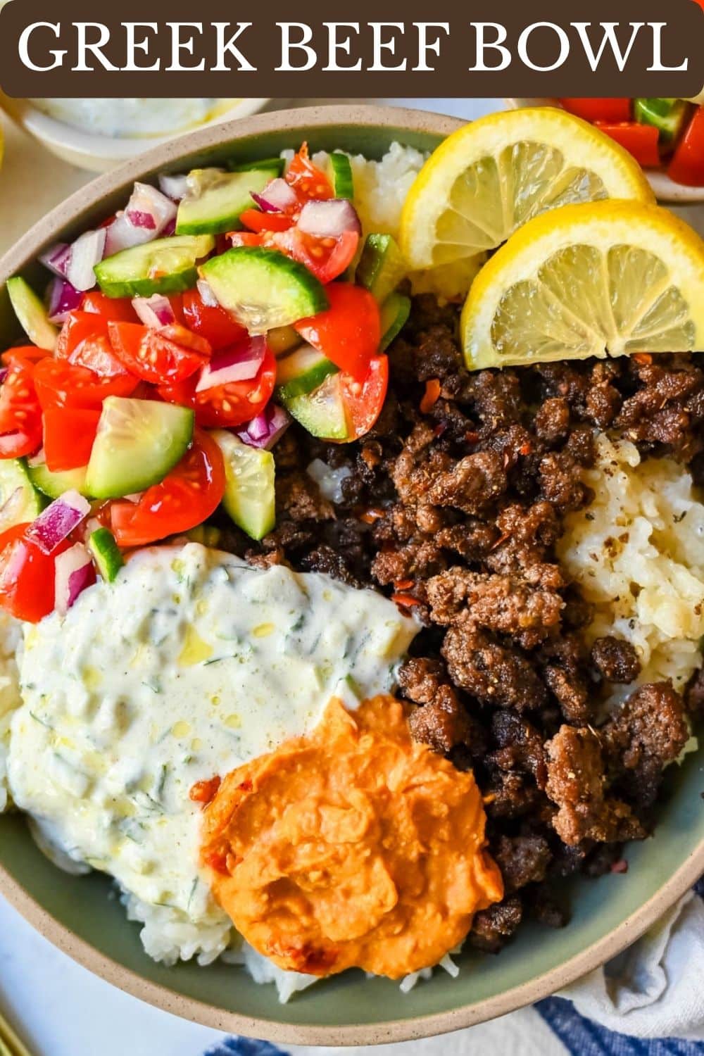 Greek Beef Bowls. Juicy seasoned ground beef, bright lemon rice, feta, cucumbers, tomatoes and tzatziki in one easy 35-minute dinner. High-protein bowls that hold up all week for lunches.