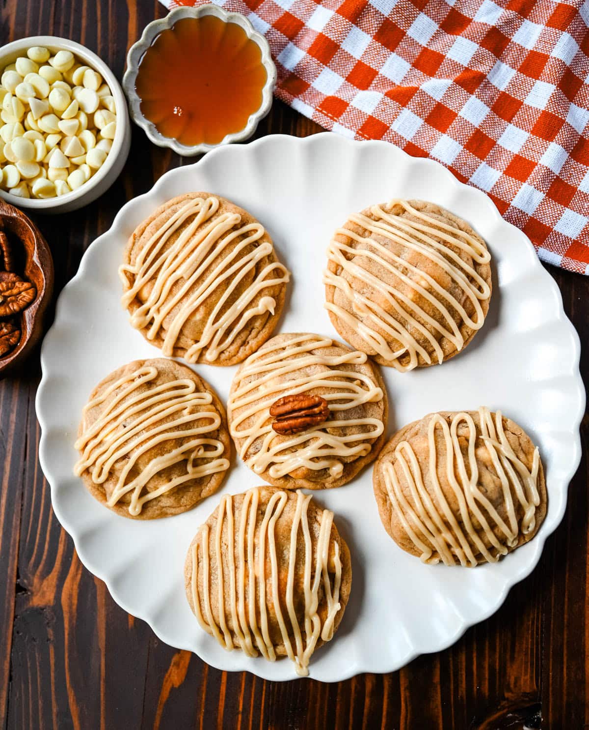Soft maple pecan cookies with toasted pecans, white chocolate, and a real maple glaze. An easy Fall maple cookie with no dough chilling required.