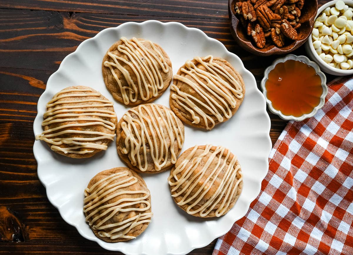 Soft maple pecan cookies with toasted pecans, white chocolate, and a real maple glaze. An easy Fall maple cookie with no dough chilling required.