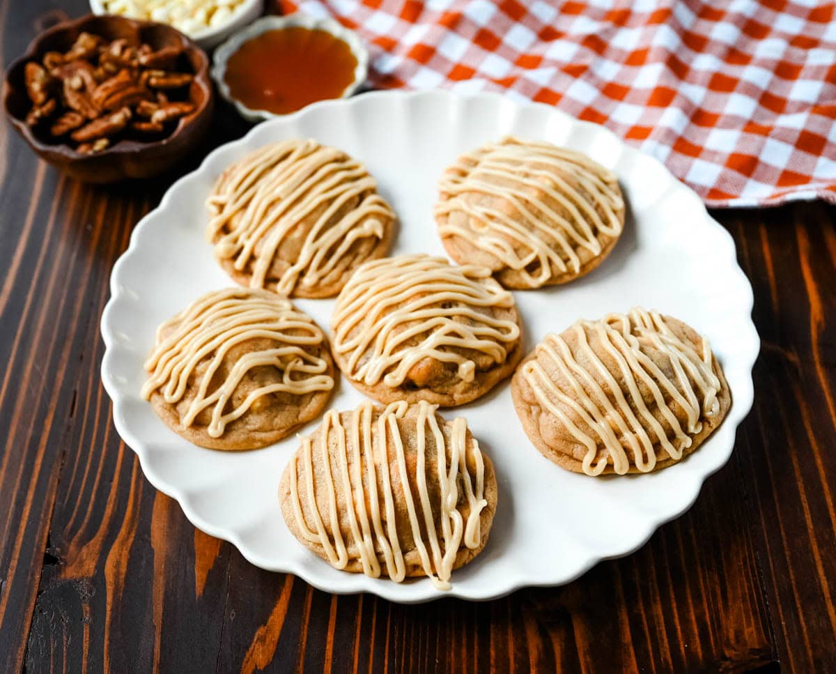 Soft maple pecan cookies with toasted pecans, white chocolate, and a real maple glaze. An easy Fall maple cookie with no dough chilling required.