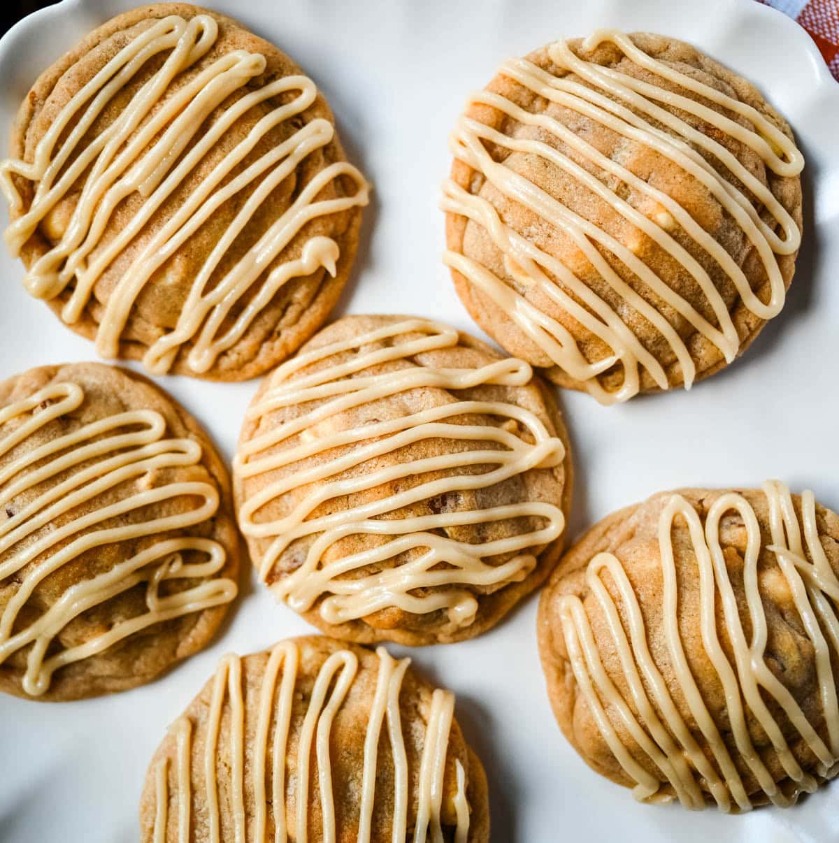 Soft maple pecan cookies with toasted pecans, white chocolate, and a real maple glaze. An easy Fall maple cookie with no dough chilling required.