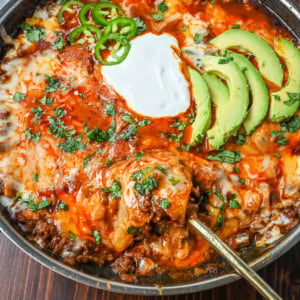 This easy Beef Enchilada Skillet recipe turns classic beef enchiladas into a quick, one-pan dinner. Ground beef, tortilla pieces, and a rich red enchilada sauce simmer together until thick and saucy, then get topped with plenty of melted cheese. Ready in about 20 minutes, making it a go-to weeknight dinner for busy nights.