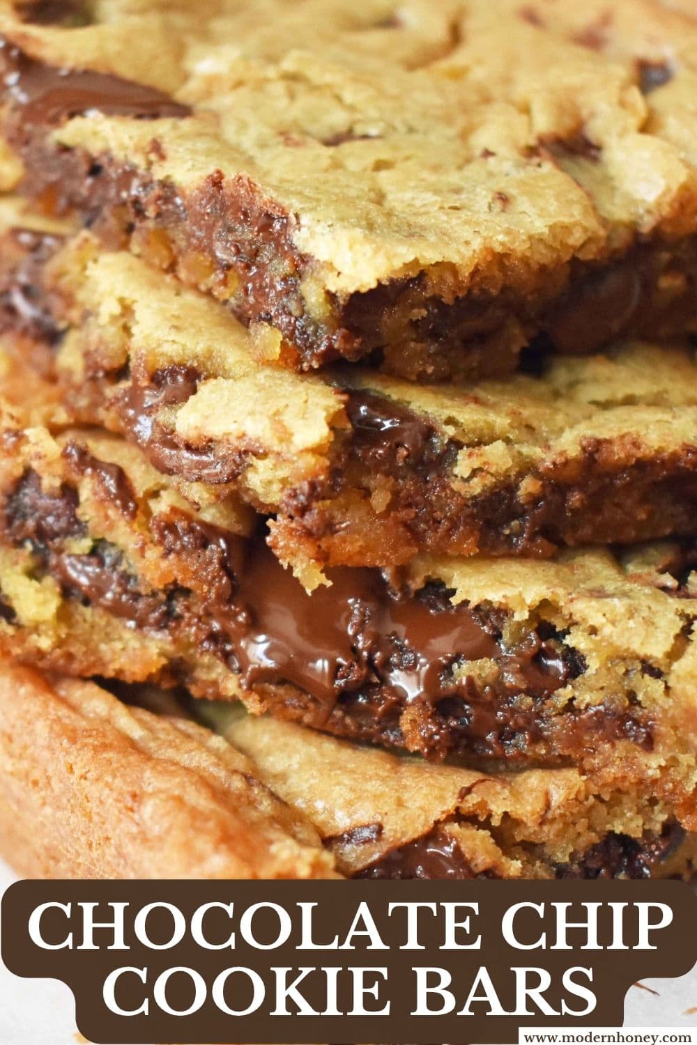 Soft, chewy chocolate chip cookie bars with crisp golden edges, made in one 9x13 pan. All the flavor of classic cookies with no scooping!
