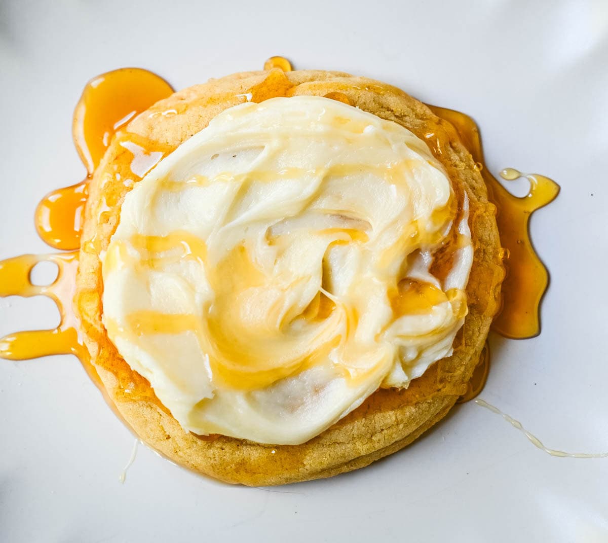 Turn your favorite cornbread into a cookie! These soft cornbread cookies have crisp golden edges, a tender cornmeal crumb, and whipped honey butter on top. Better than Crumbl!