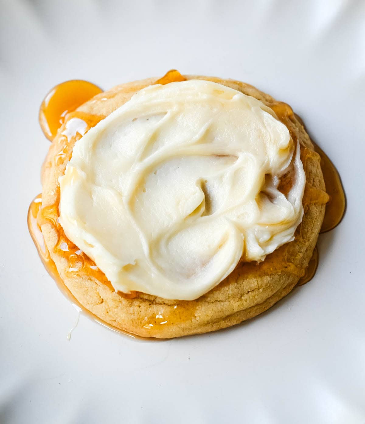 Everything you love about warm cornbread with honey butter, in a big, soft cookie. Crisp edges, a tender cornmeal crumb, and a drizzle of honey on top.
