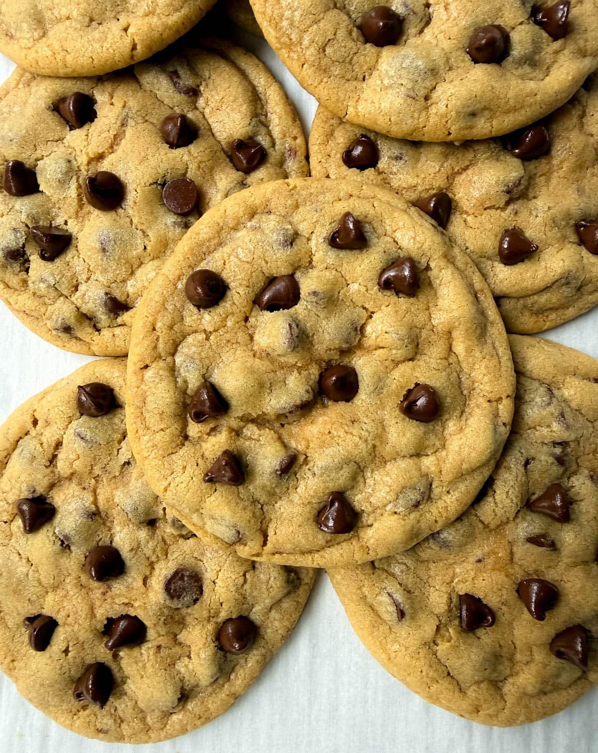 These Mrs. Fields Chocolate Chip Cookies taste just like the famous mall cookies! This easy copycat recipe makes soft, chewy chocolate chip cookies with buttery, golden edges and loads of melty chocolate chips. This is the authentic recipe found in Mrs. Field's cookbook.