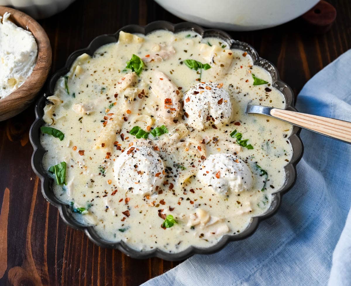 This White Chicken Lasagna Soup is everything you love about a creamy, cheesy chicken lasagna, without all the layering! Lasagna noodles, tender shredded chicken, and spinach all simmer together in one pot in a garlicky parmesan cream broth. Then you top each bowl with a dollop of herbed ricotta.